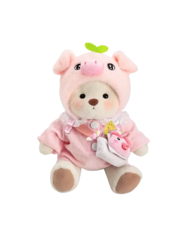 ce petit nounours blanc déguisé en cochon est la pour apporté la bonne humeur