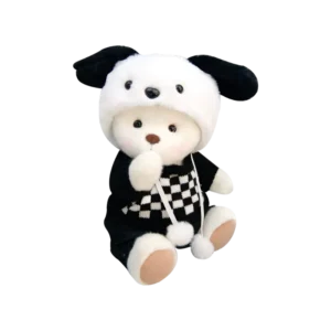 Magnifique petit nounours blanc en pull à carreaux qui est assis et attend un gros câlin.