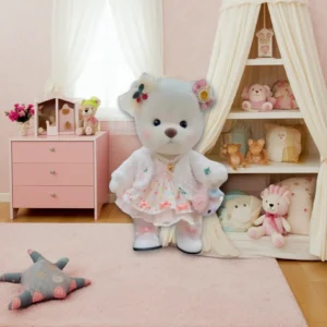 Peluche à habiller Petit Nounours blanc en robe élégante, un ours en peluche dans une chambre d'enfant